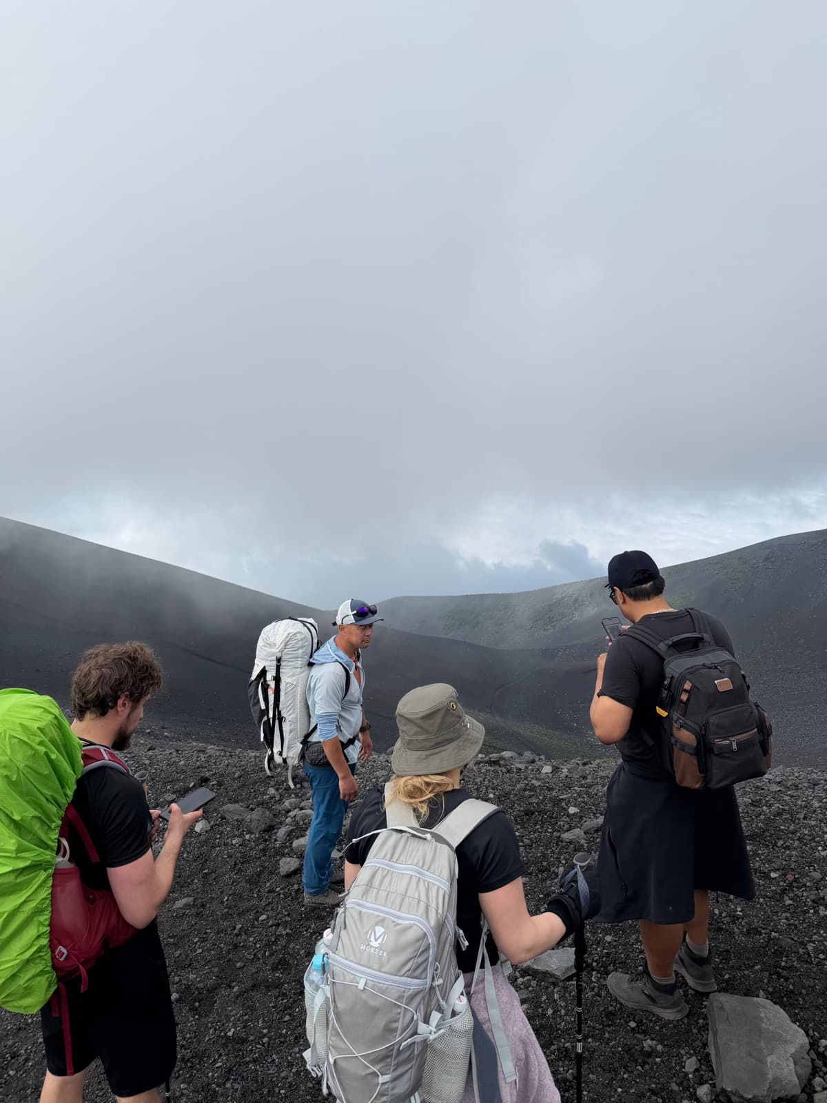 Exploring the volcanic crater in the mist