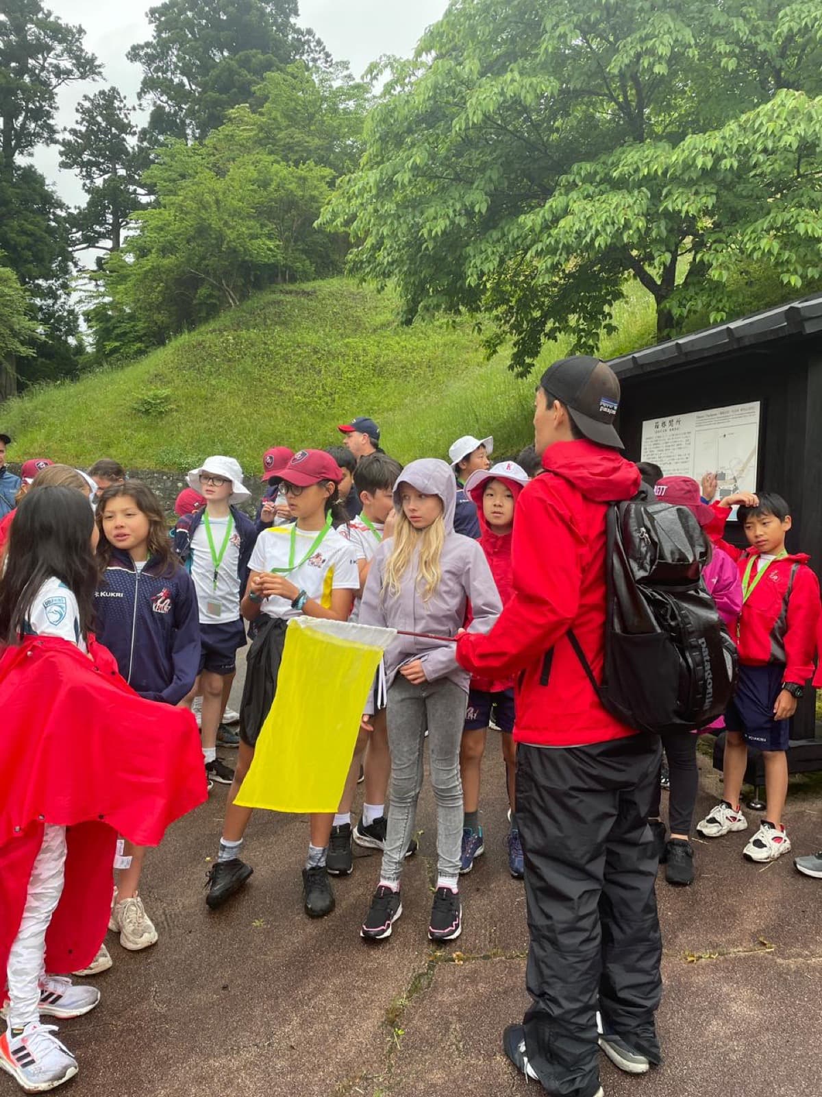 Masa guiding schoolchildren at the Hakone Checkpoint